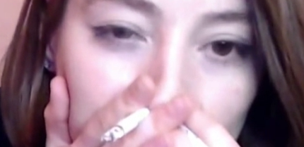 Ellie smokes 3 cigarettes elegantly and beautifully